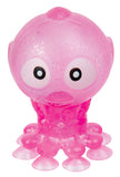 Pink octopus toy with googly eyes on a white background