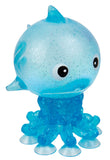 Blue glittery octopus figurine on a white background