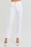 White jeans worn by a person on a plain background
