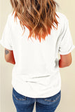 Person wearing a white t-shirt and blue jeans with a neutral background