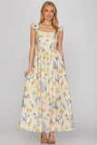 Woman wearing a floral dress with a neutral background
