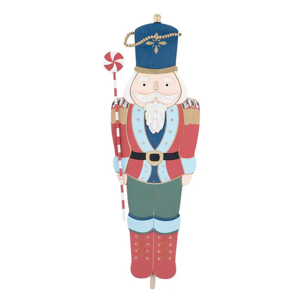 Decorative nutcracker figure on a white background