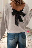 Leopard print back bow sweater in gray with black bow