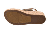 Brown sandal sole with cork texture on a white background