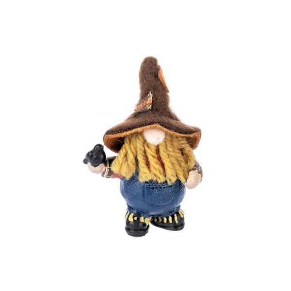 Gnome figurine with a brown hat, yellow shirt, and blue pants on a white background