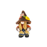 Decorative figure of a gnome with a hat and scarf on a white background