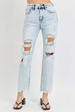 Light blue ripped jeans on a white background
