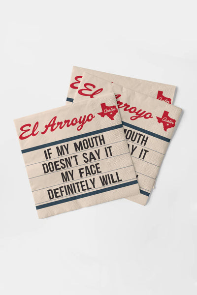Two cocktail napkins with 'El Arroyo' branding and humorous text on a white background
