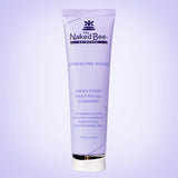 Tube of 'The Naked Bee Skincare' Fresh Start Daily Facial Cleanser on a light purple background