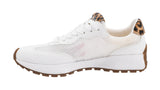 White sneaker with leopard print accents on a white background