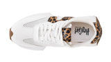 White sneaker with leopard print accents on a white background