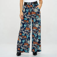 Floral patterned pants on a white background