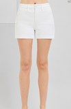 White shorts worn by a person on a plain background