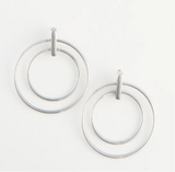 Pair of silver hoop earrings on a white background