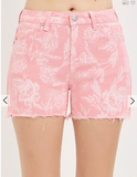 Pink floral shorts on a white background