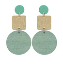 A pair of geometric drop earrings featuring a mint green top disc, a brushed gold square in the middle, and a larger textured mint green oval drop below, shown against a plain white background.