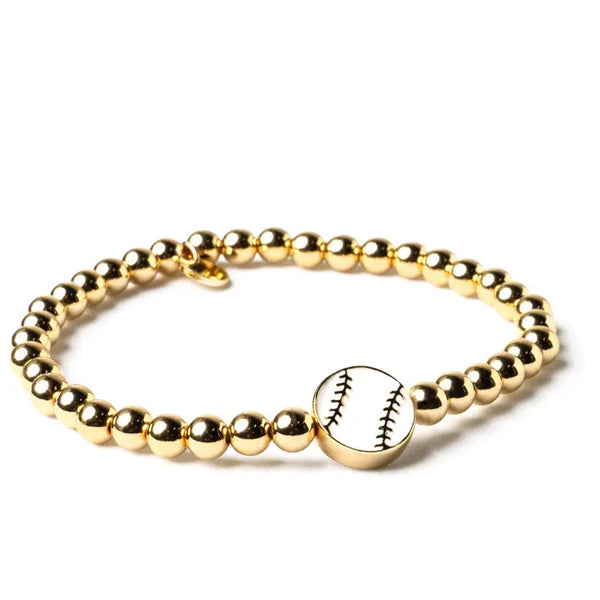 Gold beaded bracelet with a baseball charm on a white background