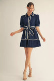 Navy blue puff short sleeve dress with bow