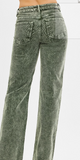 Green corduroy jeans on a white background