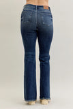 Blue jeans on a plain background