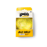 Goolala Jelly Shelly toy in its original retail packaging, featuring a yellow jelly shell with green glitter inside a clear window box.